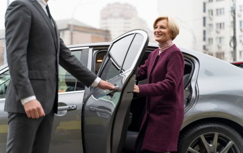 taxi-driver-female-client-interacting-formal-way_23-2149204532